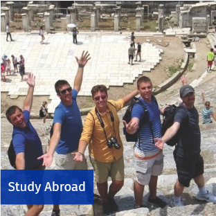 Students posing for the camera.  Access study abroad information.