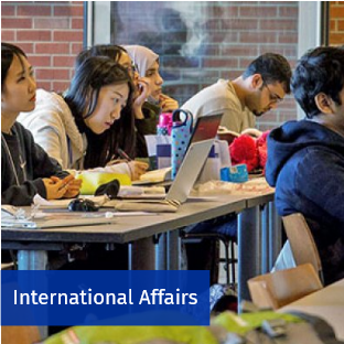 Students sitting in a classroom.  Access International Affairs information.