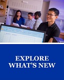 Access a list of items that are new in this catalog.  View of students standing in a lab.