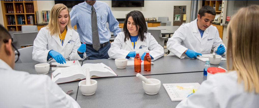 Pharmacy students in a classroom.