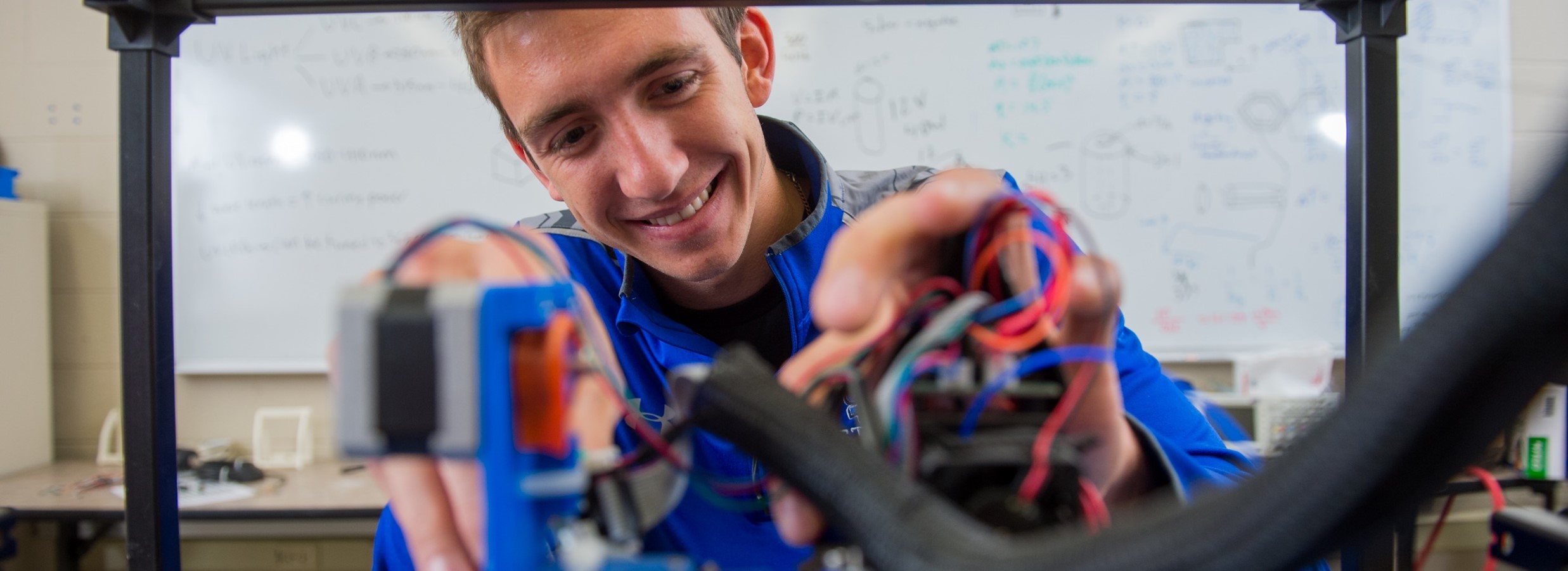 View of student working with equipment.