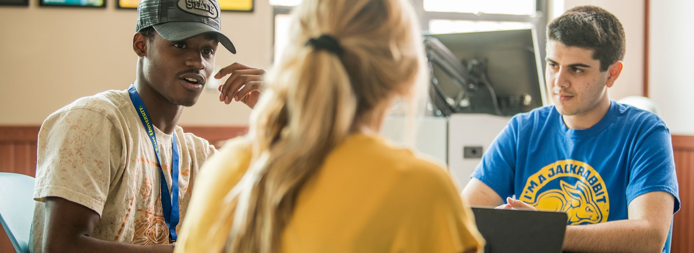 View of students sitting in class.