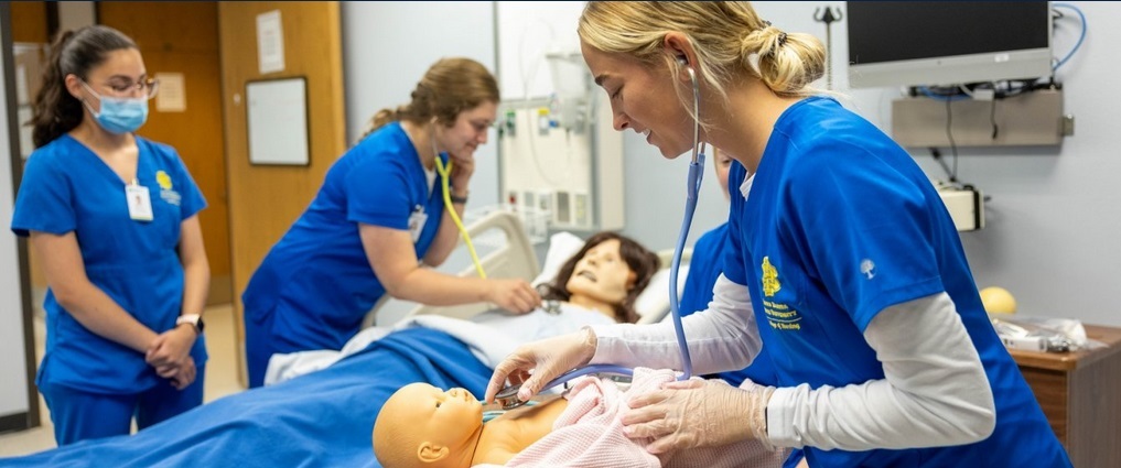 Nursing students in a simulation lab.