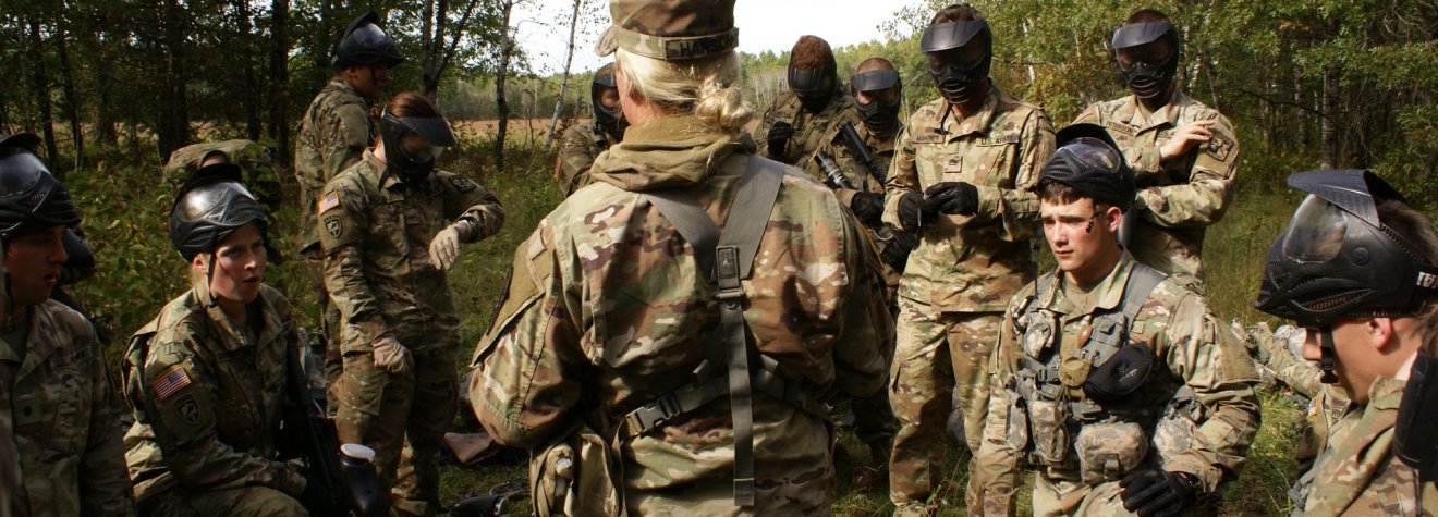 Cadets conducting an after action review following a simulated battle.