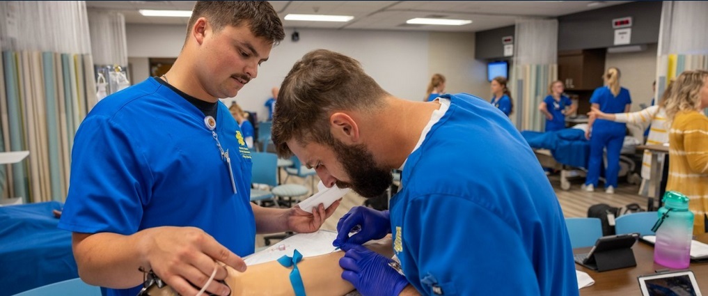 Nursing students in a simulation lab.