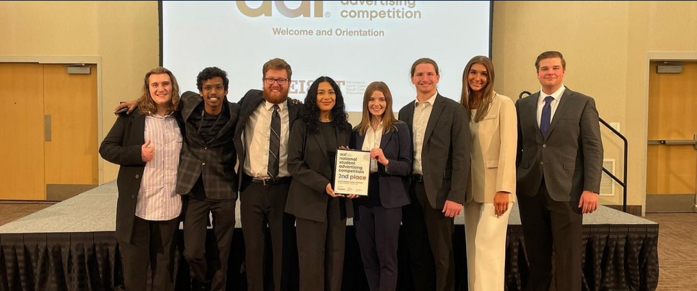 Students posing for a picture at the National Student Advertising Competition.