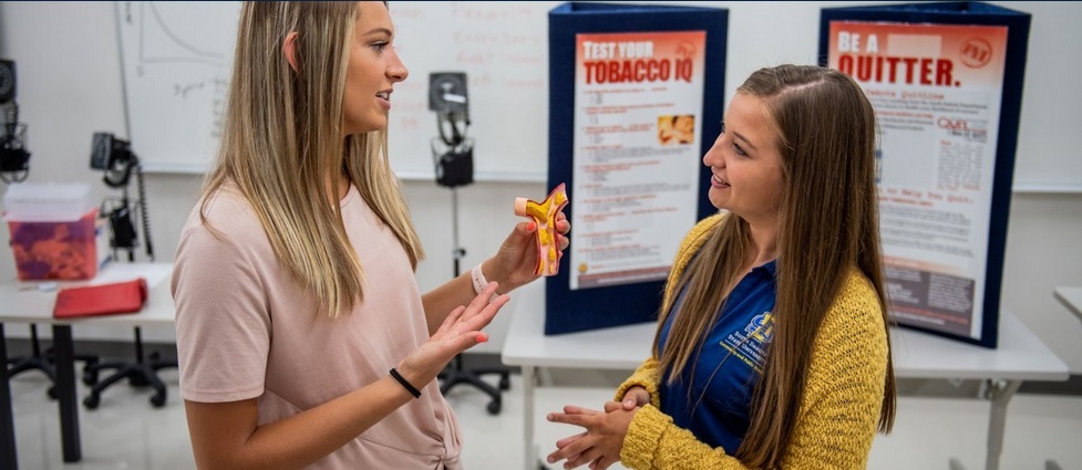 Students practicing a presentation.