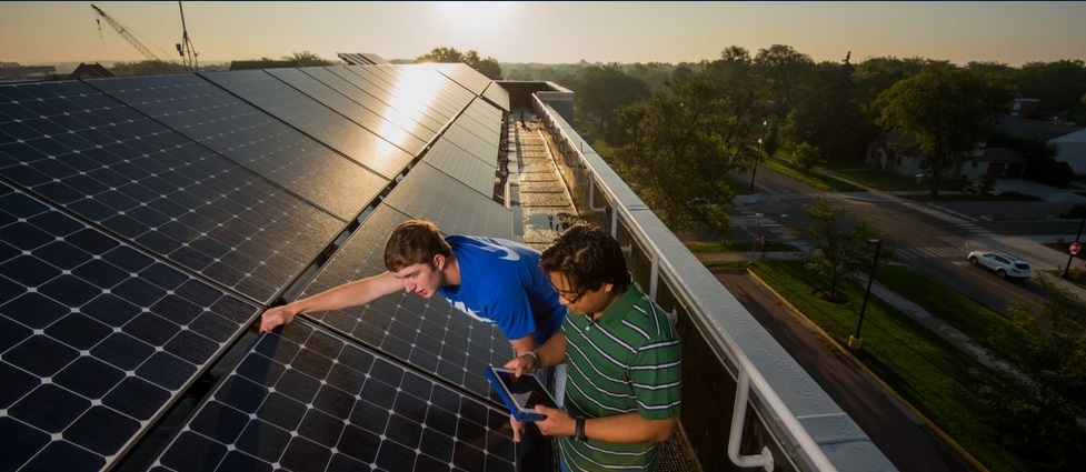 Students looking at solar panels.