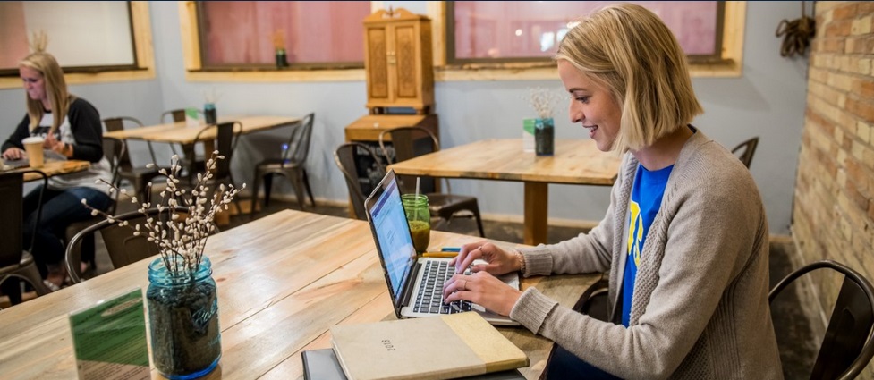 Student sitting at a table studying.