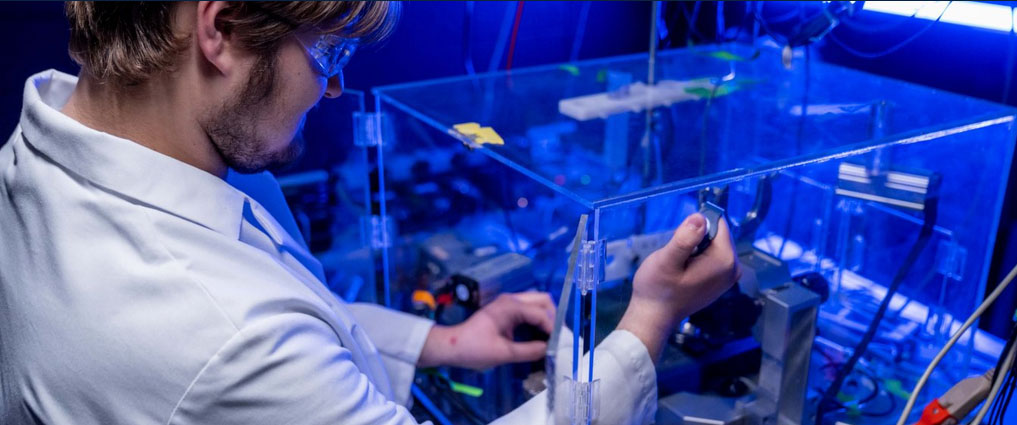 Biochemistry student working in a lab.