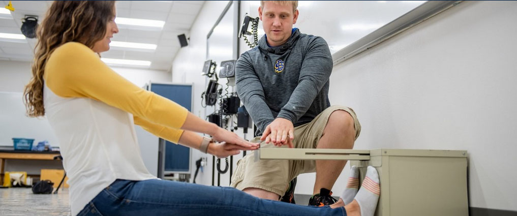 Exercise science students in a lab.