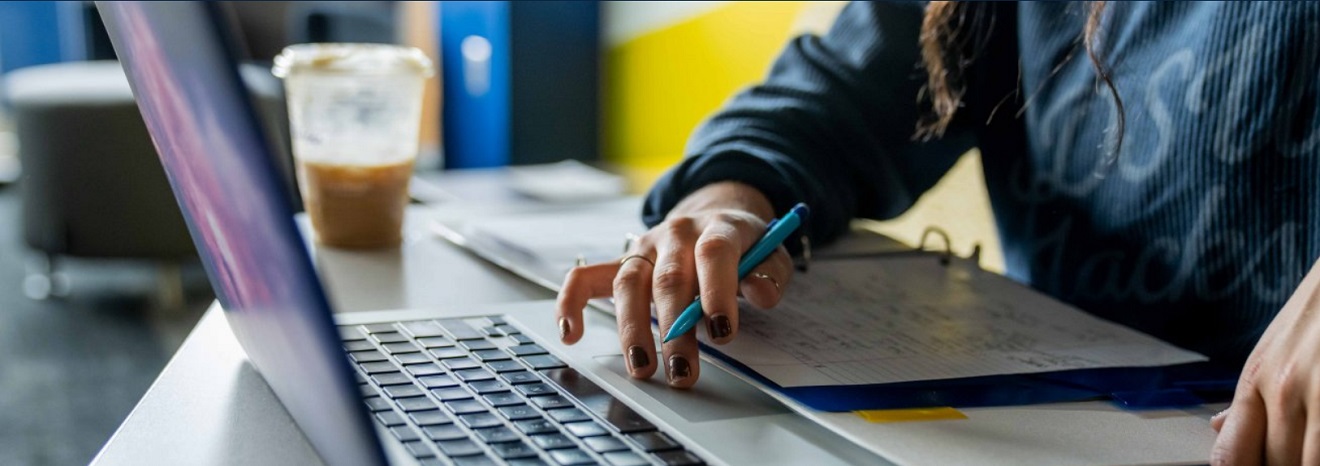 Student working at a computer.