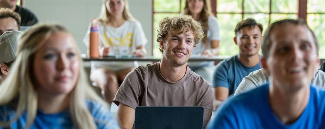 Students sitting in a classroom.