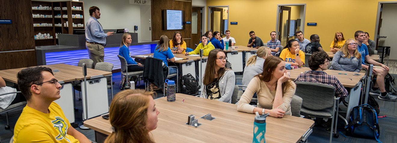 View of students in pharmacy classroom.
