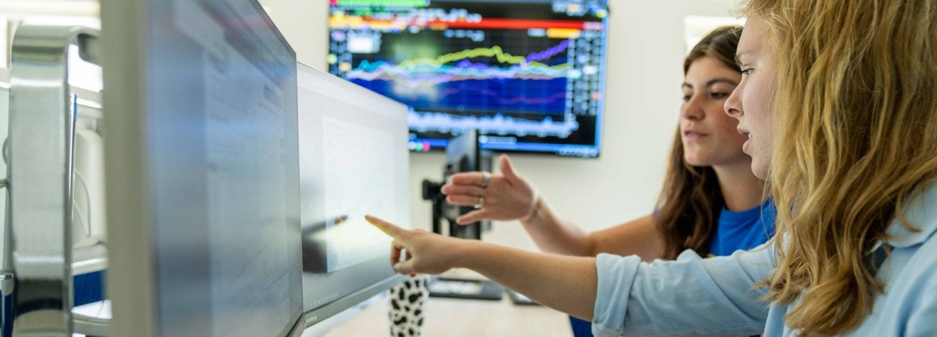 Students in the E-Trading classroom.