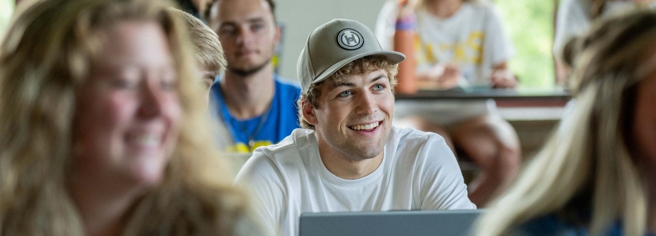 Students sitting in a classroom.